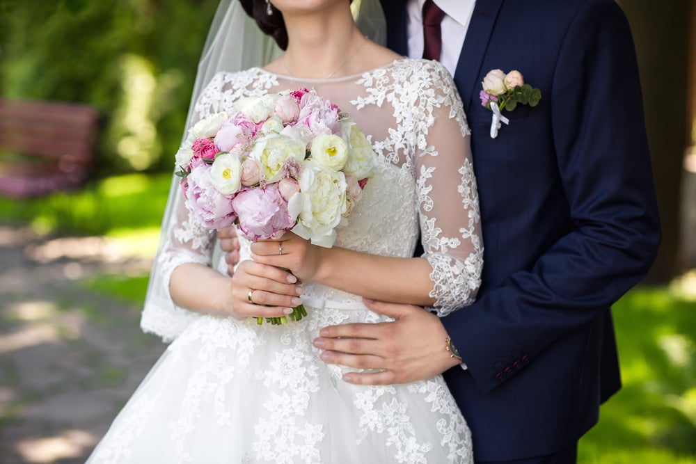 Bride-and-groom-pose-together-for-picture